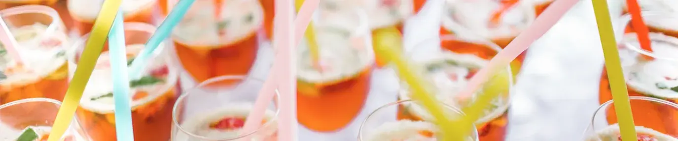 straws inside cocktail glasses; straw bans are flawed